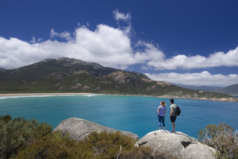 Couple standing at Pillar Point in Wilsons Promontory © Visit Victoria Couple standing at Pillar Point in Wilsons Promontory © Visit Victoria