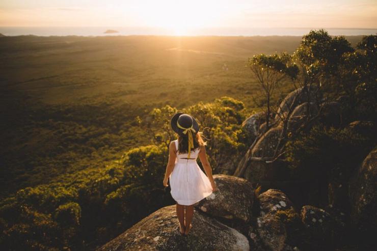 Woman looking out to sunset from Vereker Outlook, Wilsons Promontory, Victoria © Hannes Becker/ STA Travel/ Visit Victoria Woman looking out to sunset from Vereker Outlook, Wilsons Promontory, Victoria © Hannes Becker/ STA Travel/ Visit Victoria