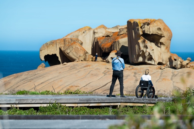 Two people gaze at the Remarkable Rocks, Kangaroo Island, South Australia © Tourism Australia Two people gaze at the Remarkable Rocks, Kangaroo Island, South Australia © Tourism Australia