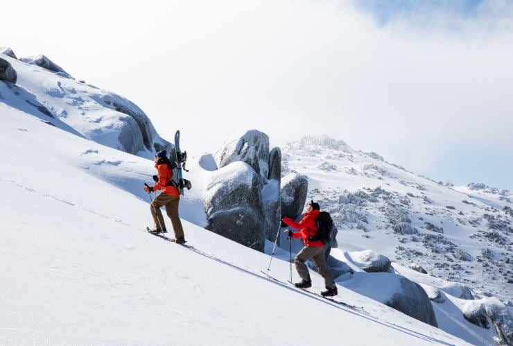 Two people hiking upa snow-covered mountain at Dead Horse Gap Backcountry, Thredbo, New South Wales © Thredbo 