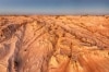 Aerial view over the rugged sand and clay formations of the Walls of China, Mungo National Park, New South Wales © Destination NSW