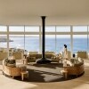 Couple walking through the beautifully appointed lounge area of Southern Ocean Lodge, Kangaroo Island, South Australia © South Australian Tourism Commission